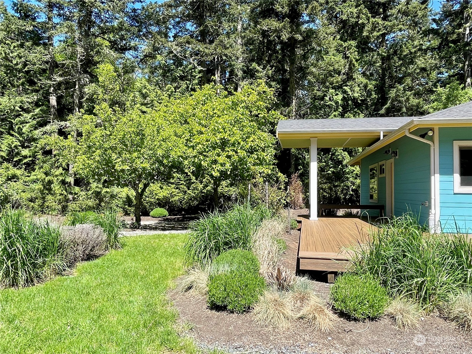 150 Carter Beach Road Friday Harbor, WA 98250 - Photo 6 of 39 a view of a chair and table in the garden