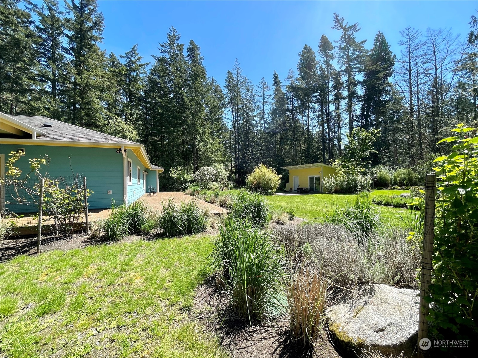 150 Carter Beach Road Friday Harbor, WA 98250 - Photo 9 of 39 a view of backyard with outdoor seating and green space