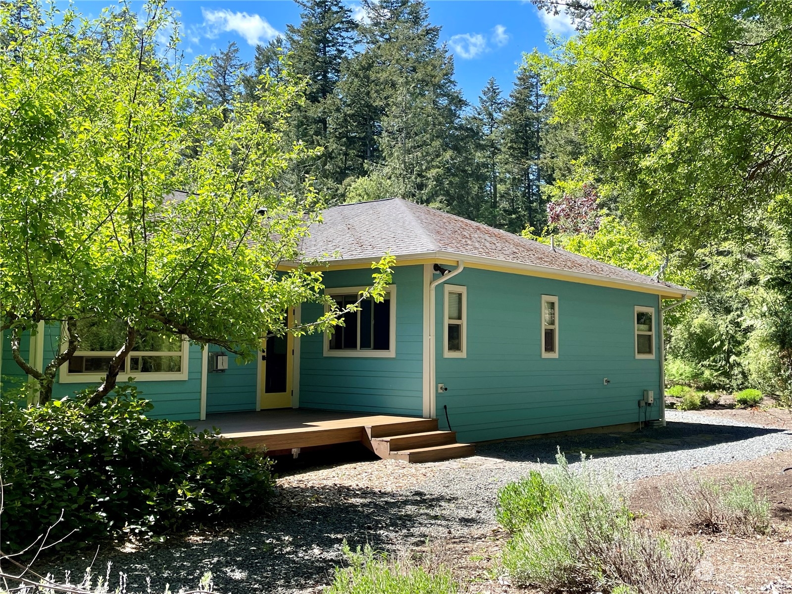 150 Carter Beach Road Friday Harbor, WA 98250 - Photo 10 of 39 a front view of a house with garden