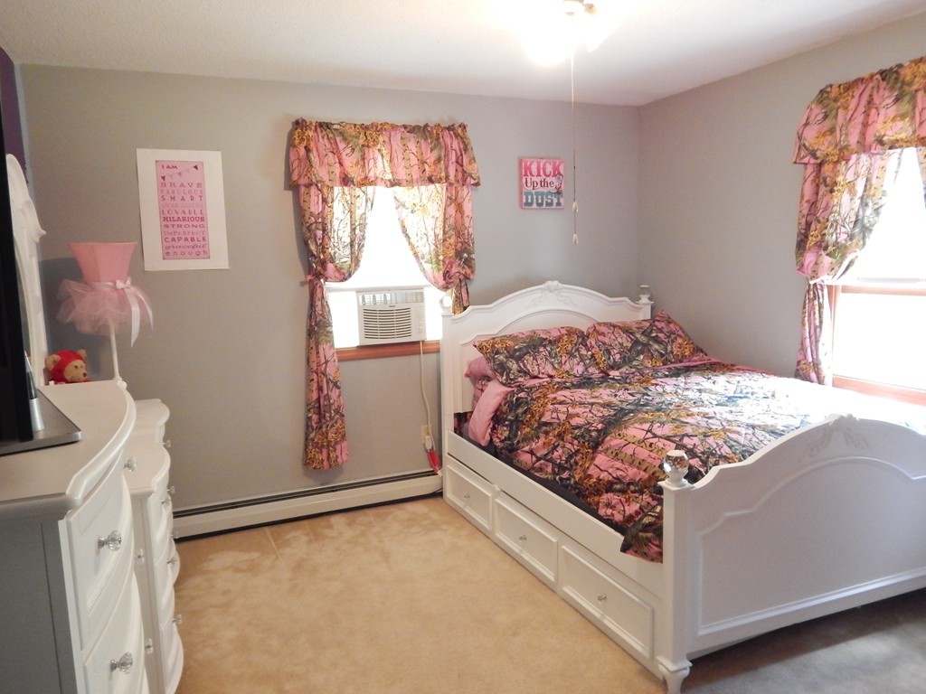 129 Boston Road Palmer, MA 01069 - Photo 15 of 23 a bedroom with a bed and a window