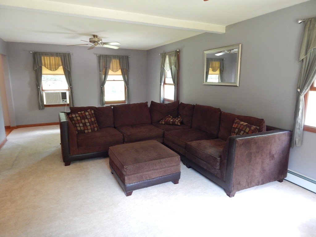 129 Boston Road Palmer, MA 01069 - Photo 9 of 23 a living room with furniture and a window