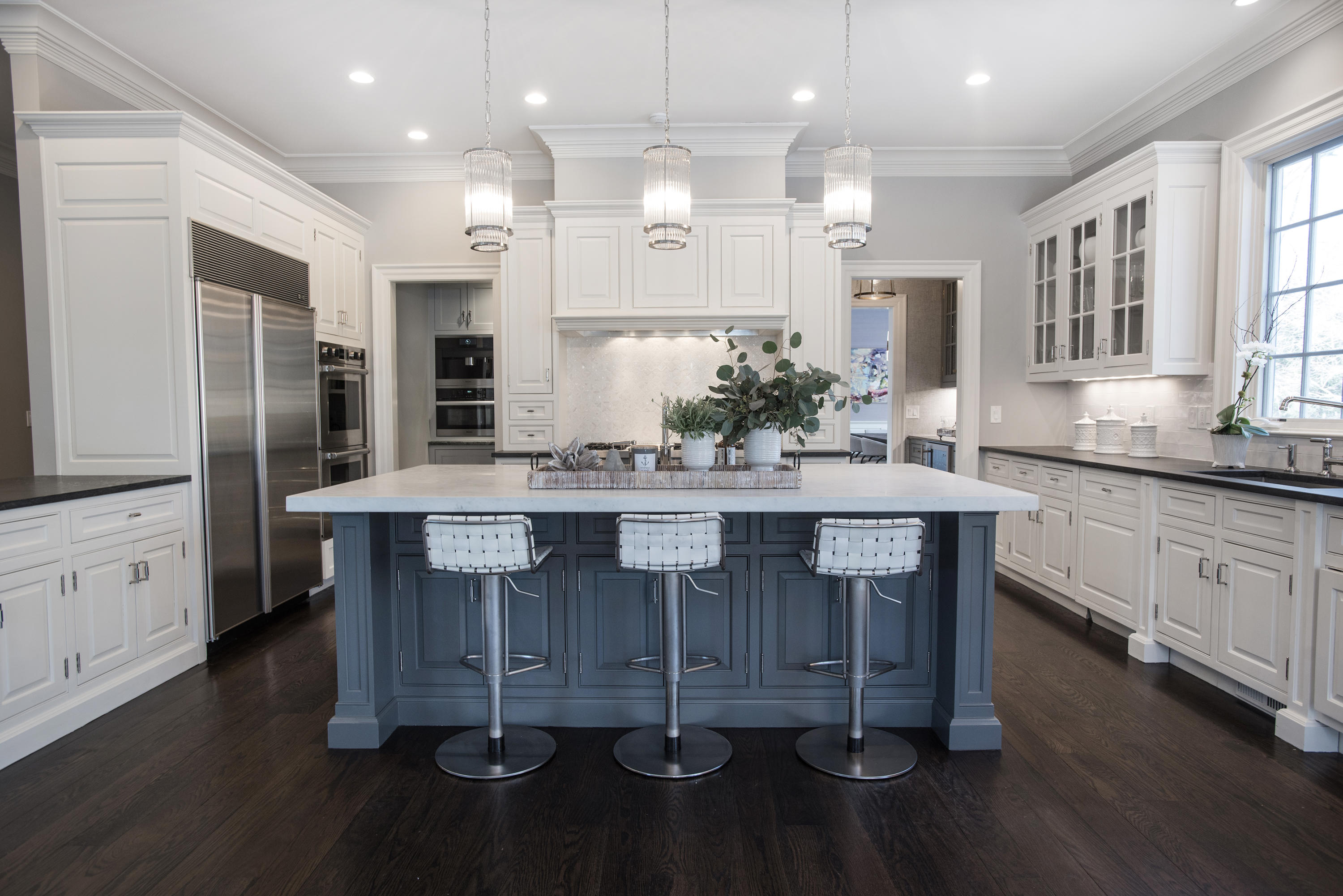 1629 Ponus Ridge Road New Canaan, CT 06840 - Photo 16 of 51 a kitchen with kitchen island granite countertop a sink counter space and stainless steel appliances