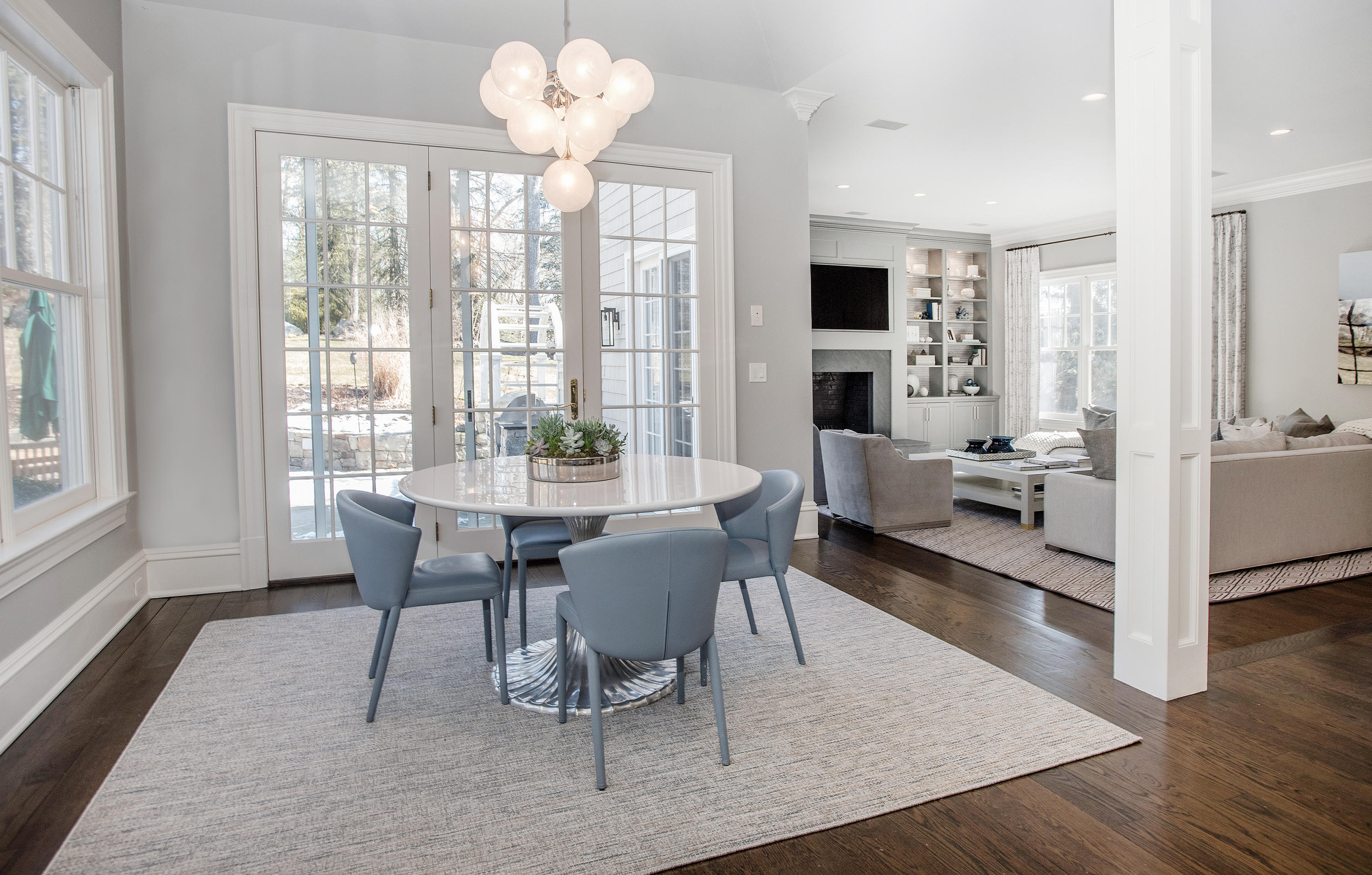 1629 Ponus Ridge Road New Canaan, CT 06840 - Photo 23 of 51 a view of a dining room with furniture window and wooden floor