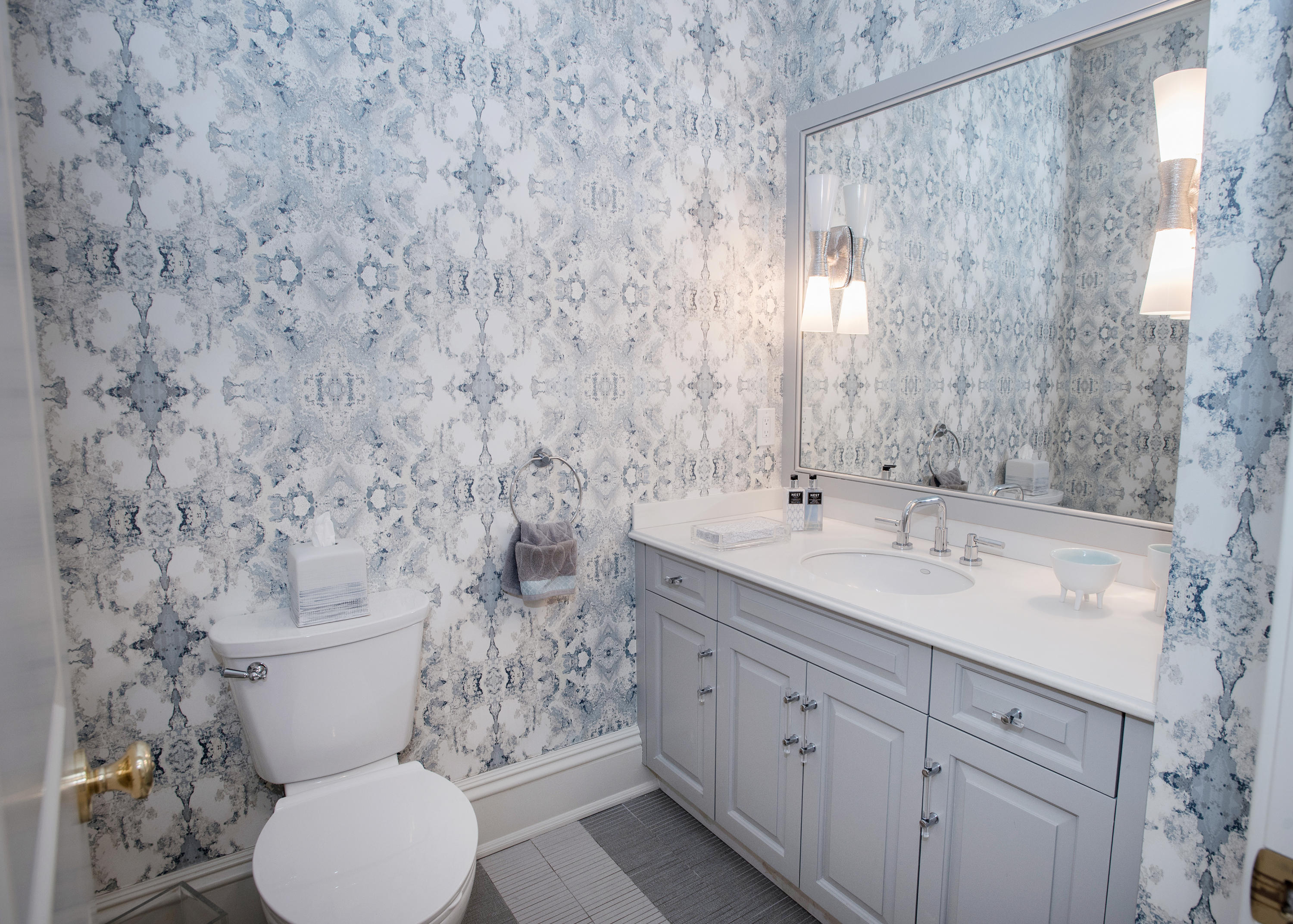 1629 Ponus Ridge Road New Canaan, CT 06840 - Photo 25 of 51 a bathroom with a granite countertop toilet sink and mirror
