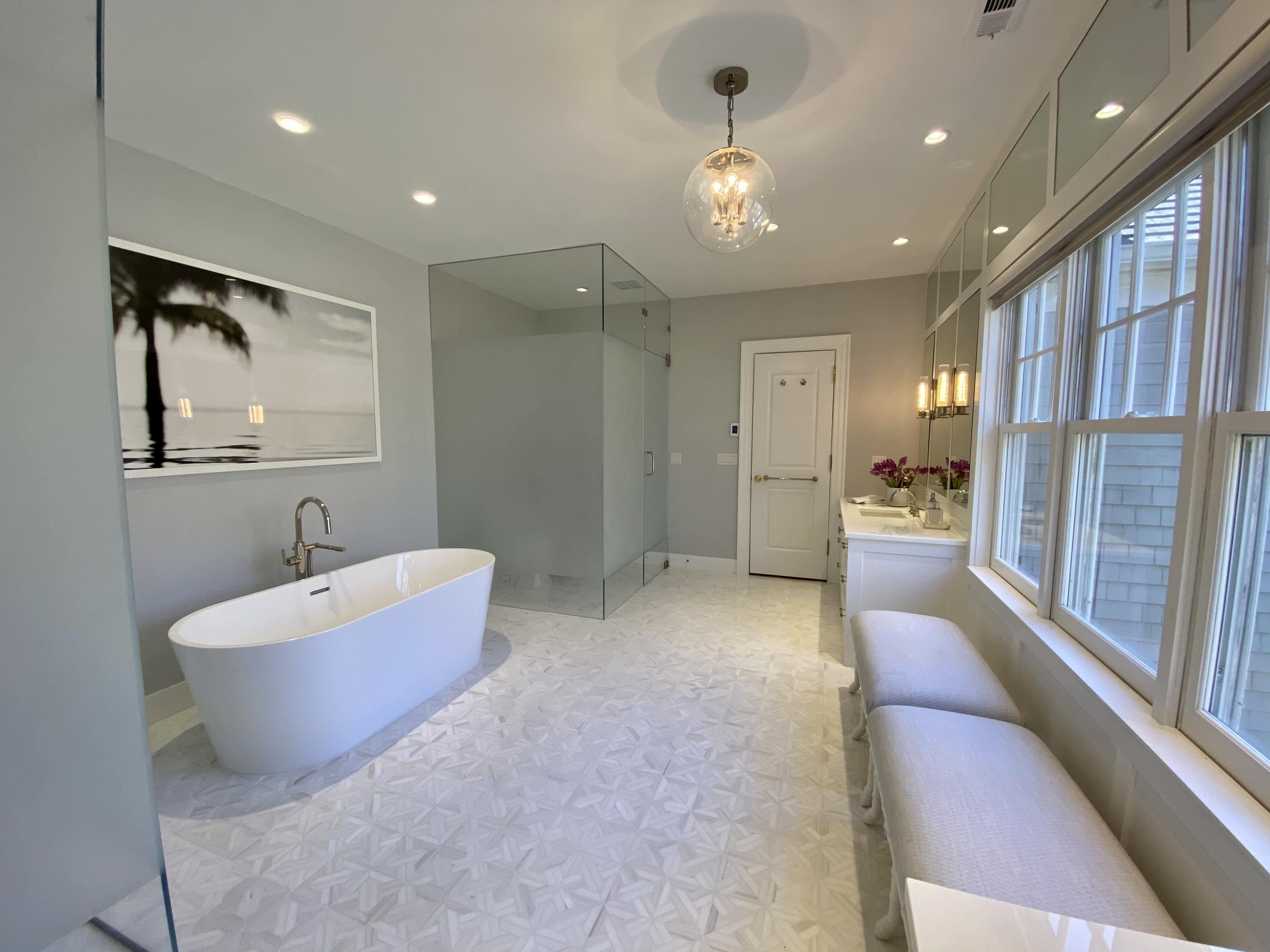 1629 Ponus Ridge Road New Canaan, CT 06840 - Photo 30 of 51 a spacious bathroom with a bathtub and shower
