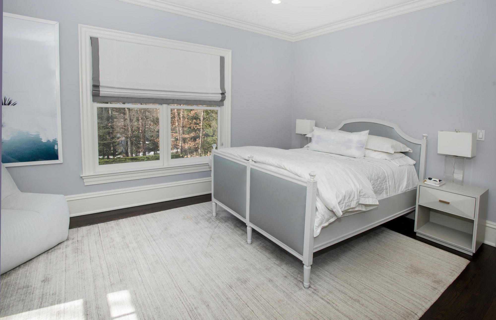 1629 Ponus Ridge Road New Canaan, CT 06840 - Photo 35 of 51 a bedroom with a bed and a window