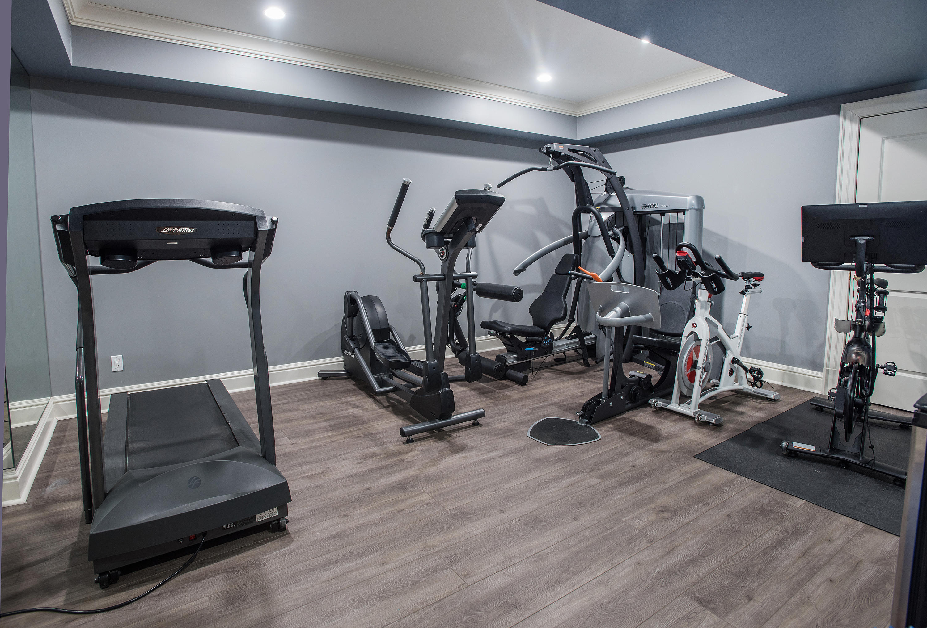 1629 Ponus Ridge Road New Canaan, CT 06840 - Photo 46 of 51 a view of a room with gym equipment