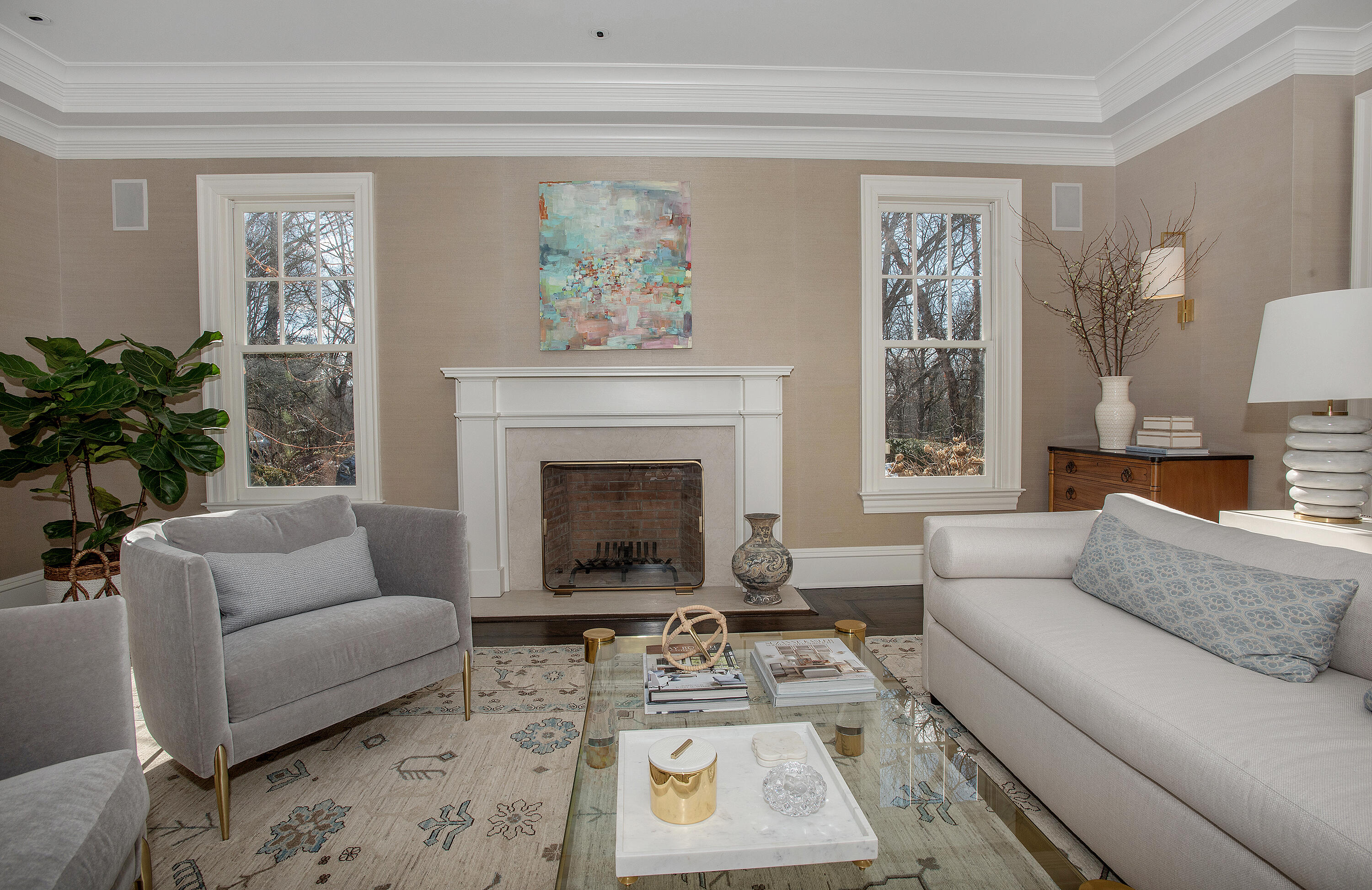 1629 Ponus Ridge Road New Canaan, CT 06840 - Photo 9 of 51 a living room with furniture a rug a window and a fireplace