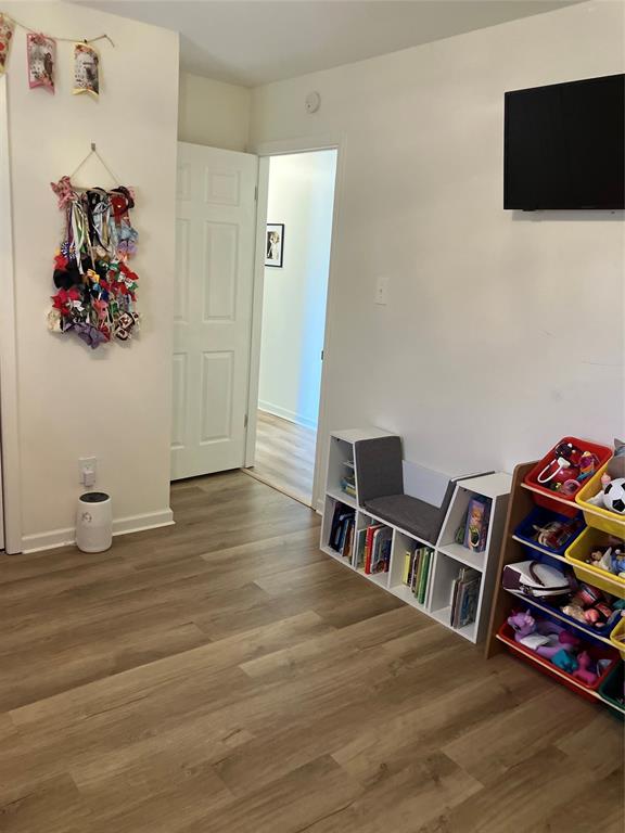 233 Church Road Stonewall, LA 71078 - Photo 9 of 32 Game room featuring wood finished floors and baseboards