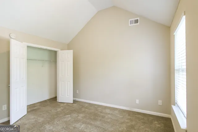 an empty room with windows