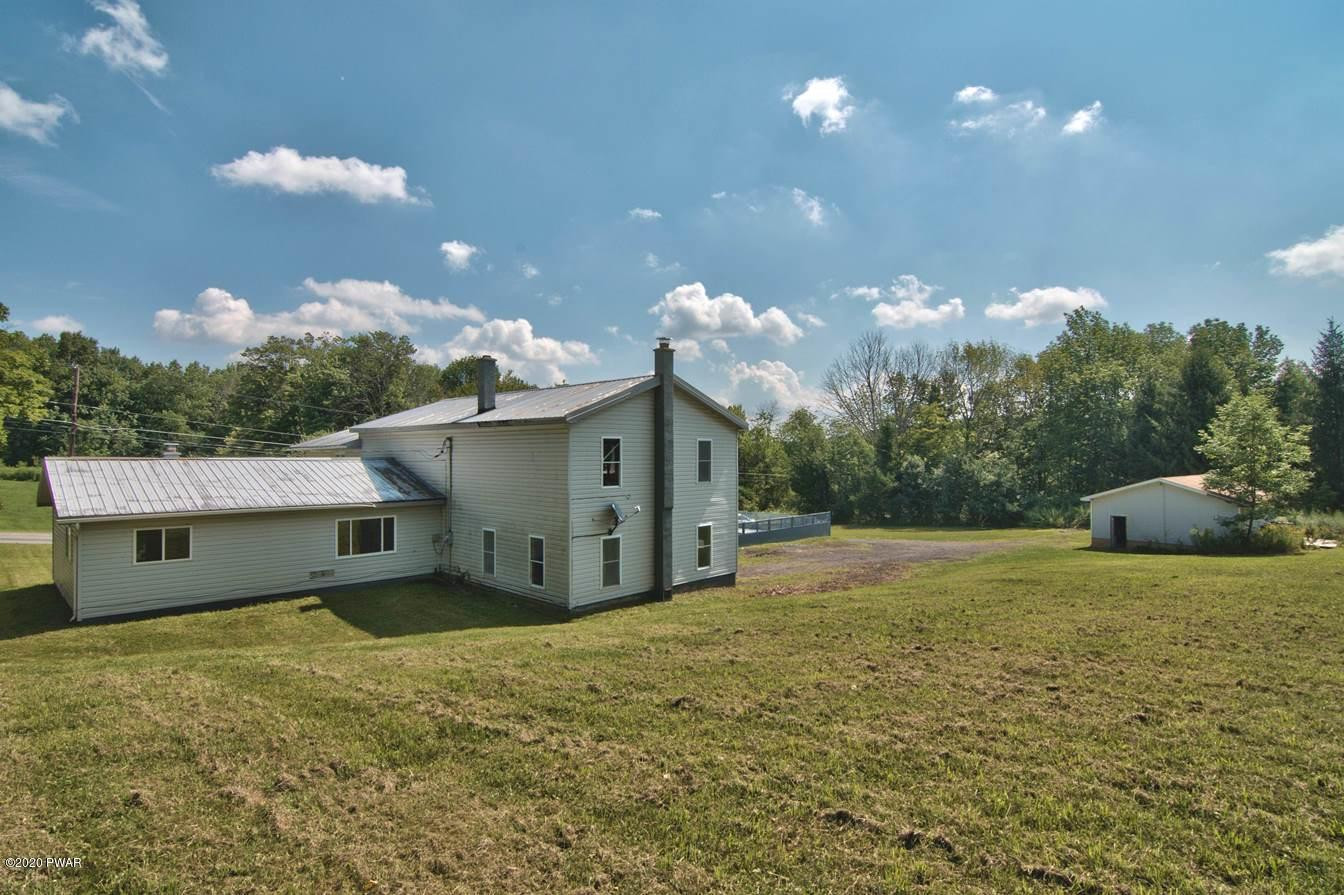 5690 Haas Pond Road Moscow, PA 18444 - Photo 5 of 79 Side view