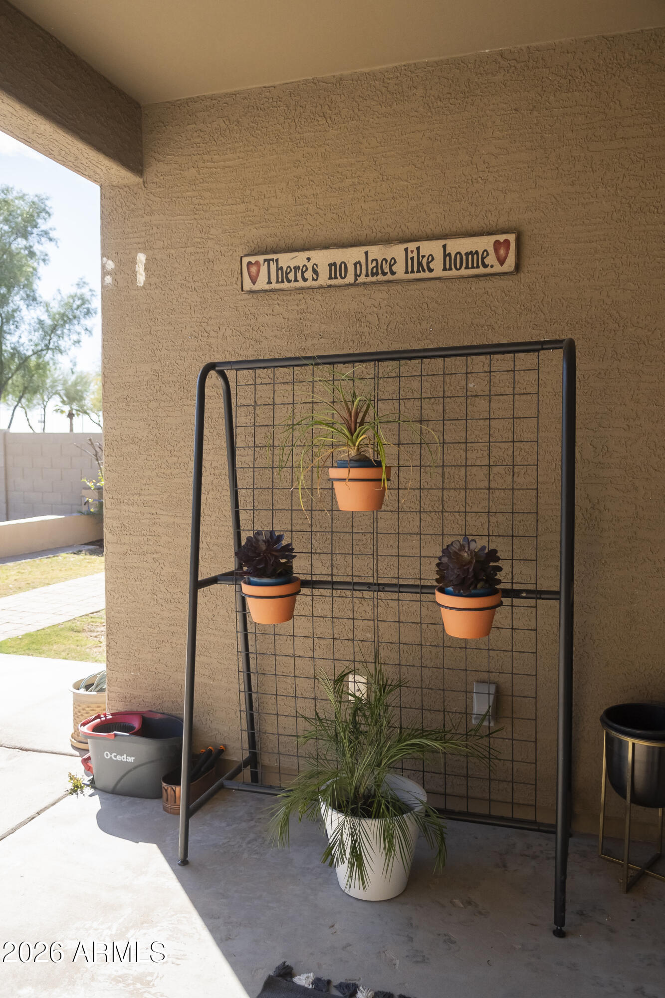 16045 West Almeria Road Goodyear, AZ 85395 - Photo 28 of 31 a bathroom with a sink a toilet and shower