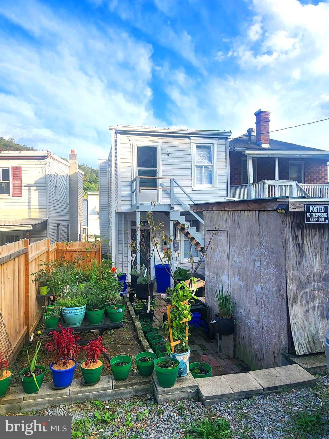 412 Furnace Street Cumberland, MD 21502 - Photo 3 of 3 a front view of a house with a yard