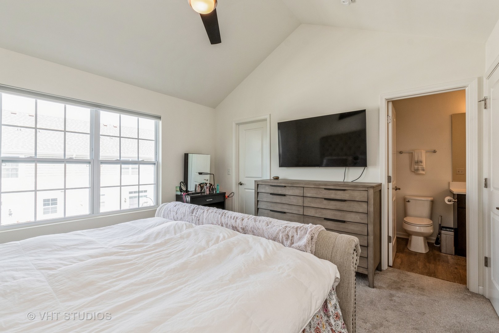 285 Timber Ridge Court Joliet, IL 60431 - Photo 11 of 21 a bedroom with a bed and a flat screen tv