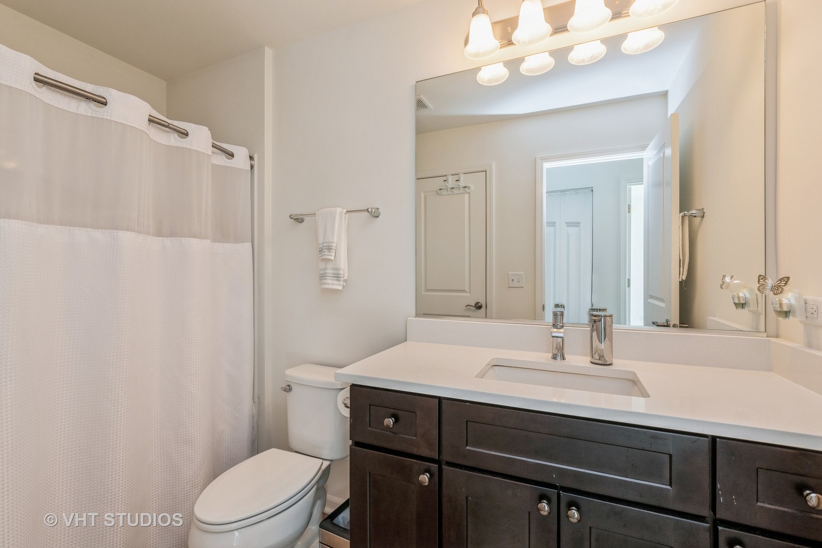 285 Timber Ridge Court Joliet, IL 60431 - Photo 13 of 21 a bathroom with a sink a toilet and shower