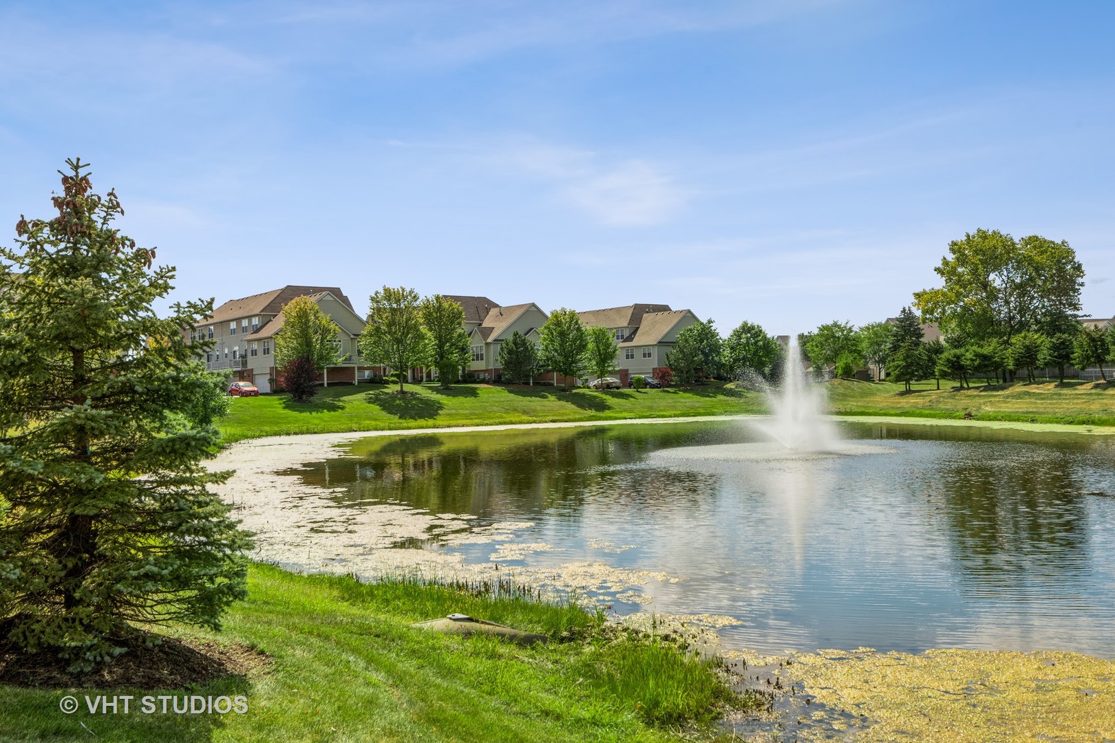 285 Timber Ridge Court Joliet, IL 60431 - Photo 18 of 21 a view of a lake with a big yard