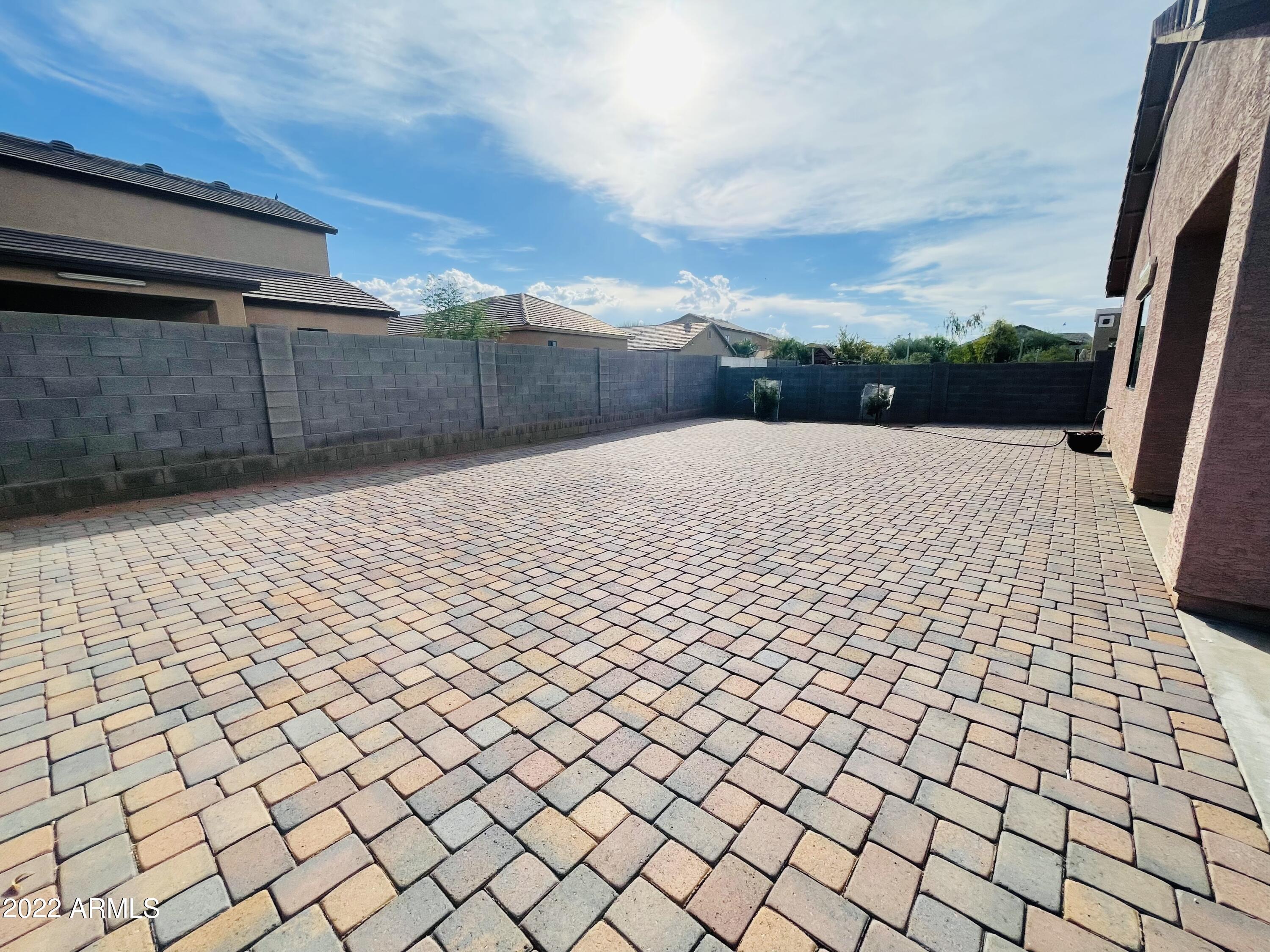 1215 West Carson Road Phoenix, AZ 85041 - Photo 22 of 42 30 by 50 paver backyeard