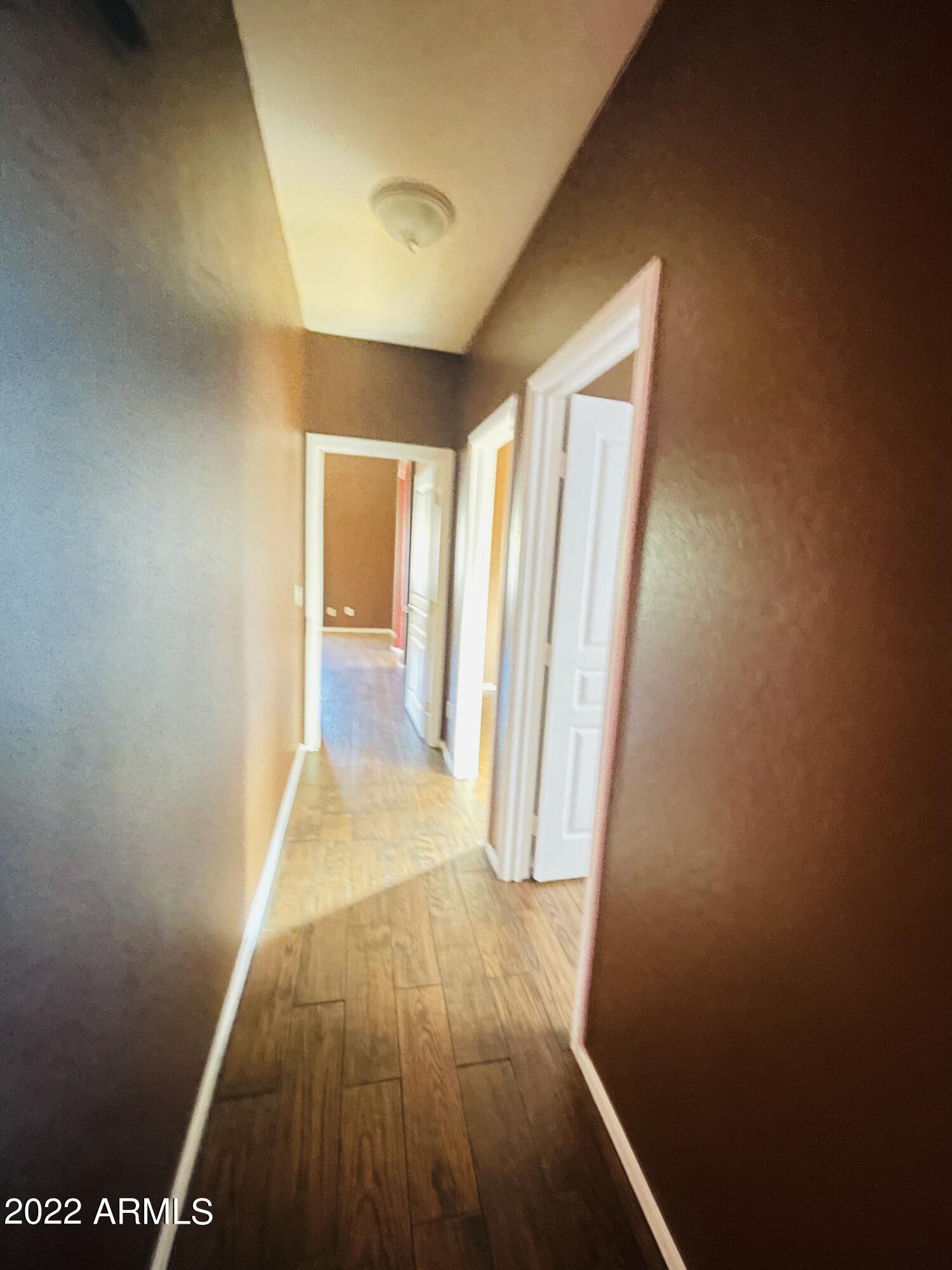 1215 West Carson Road Phoenix, AZ 85041 - Photo 9 of 42 Hallway to rooms