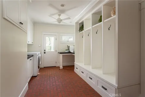 a view of an outside dining space with furniture window and outside view