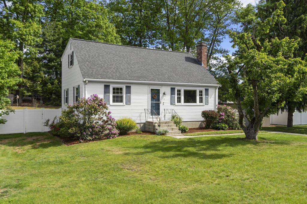 6 Edith Road Hudson, MA 01749 - Photo 1 of 30 a view of a house with a yard and trees
