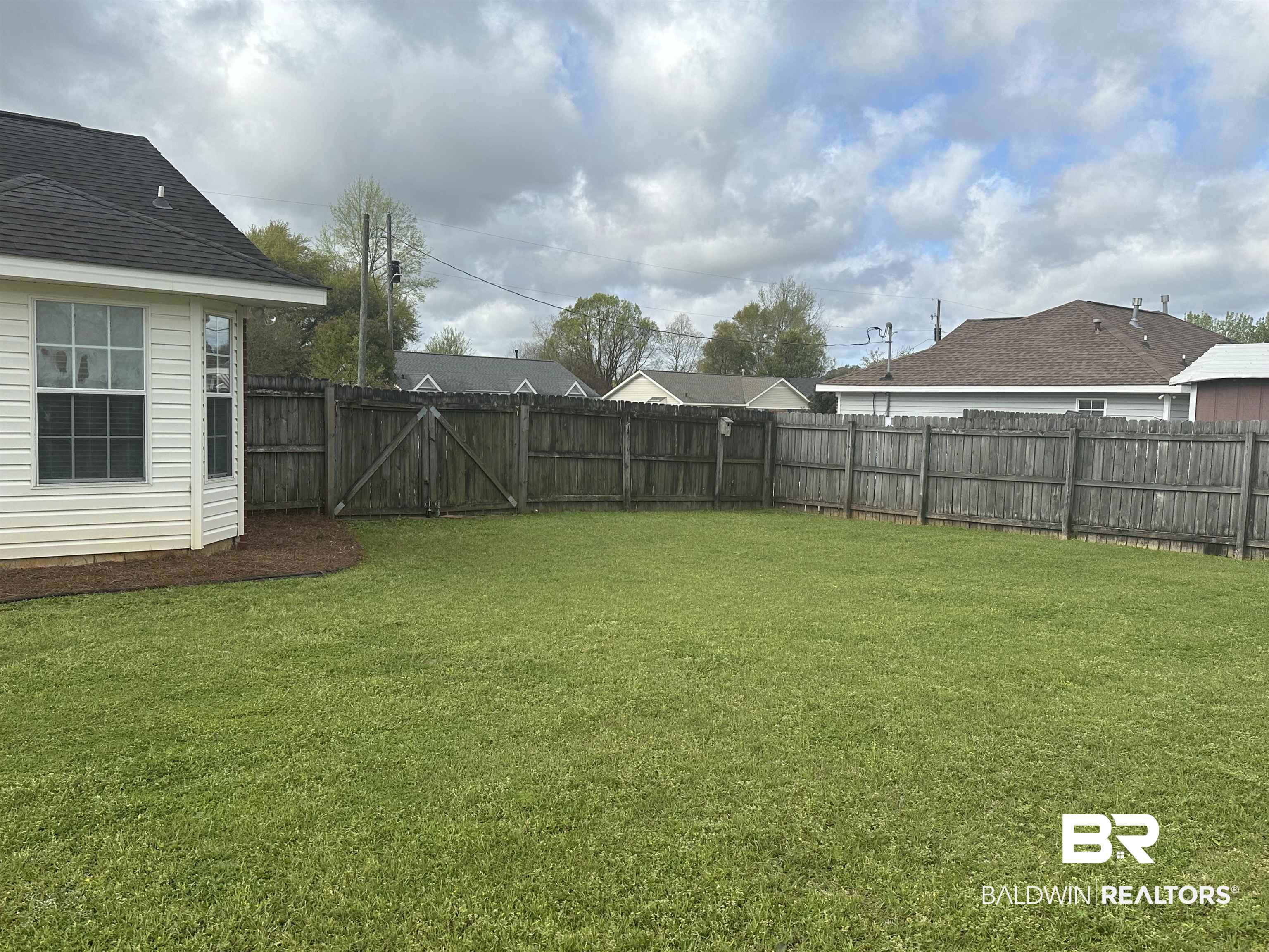 4882 Rebecca Place Mobile, AL 36695 - Photo 9 of 29 View of yard featuring a fenced backyard