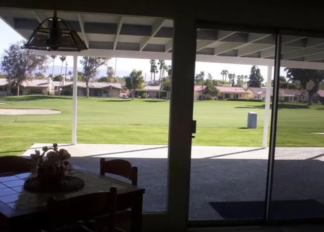 a view of a lake from a room with a lake view