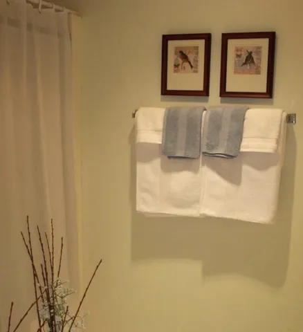 a bathroom with a tub and sink