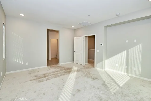 a view of a big room with a large window