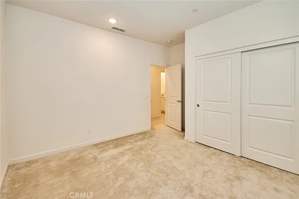 an empty room with an entryway