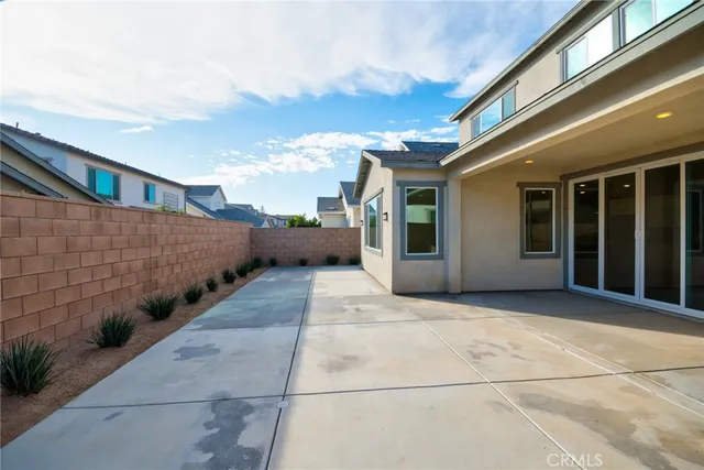 a view of a building with a yard