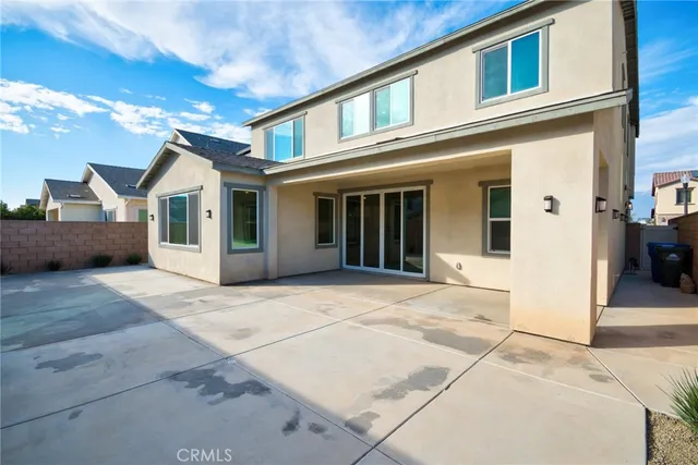 a view of a house with a patio
