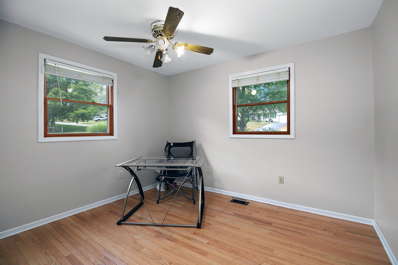 3926 East Chestnut Street Kankakee, IL 60901 - Photo 8 of 14 a workspace with wooden floor and a window