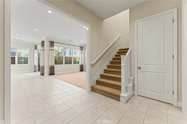 a view of entryway and hall with a window