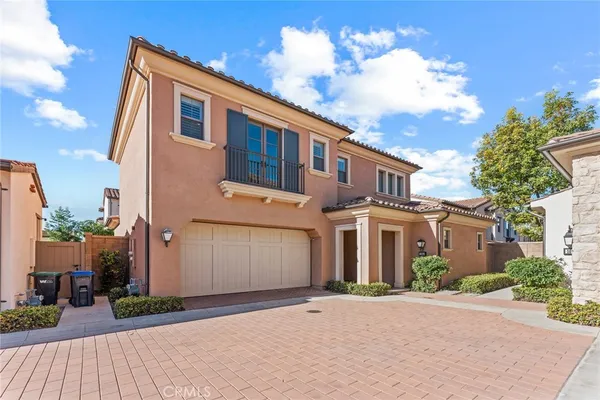 a front view of a house with yard