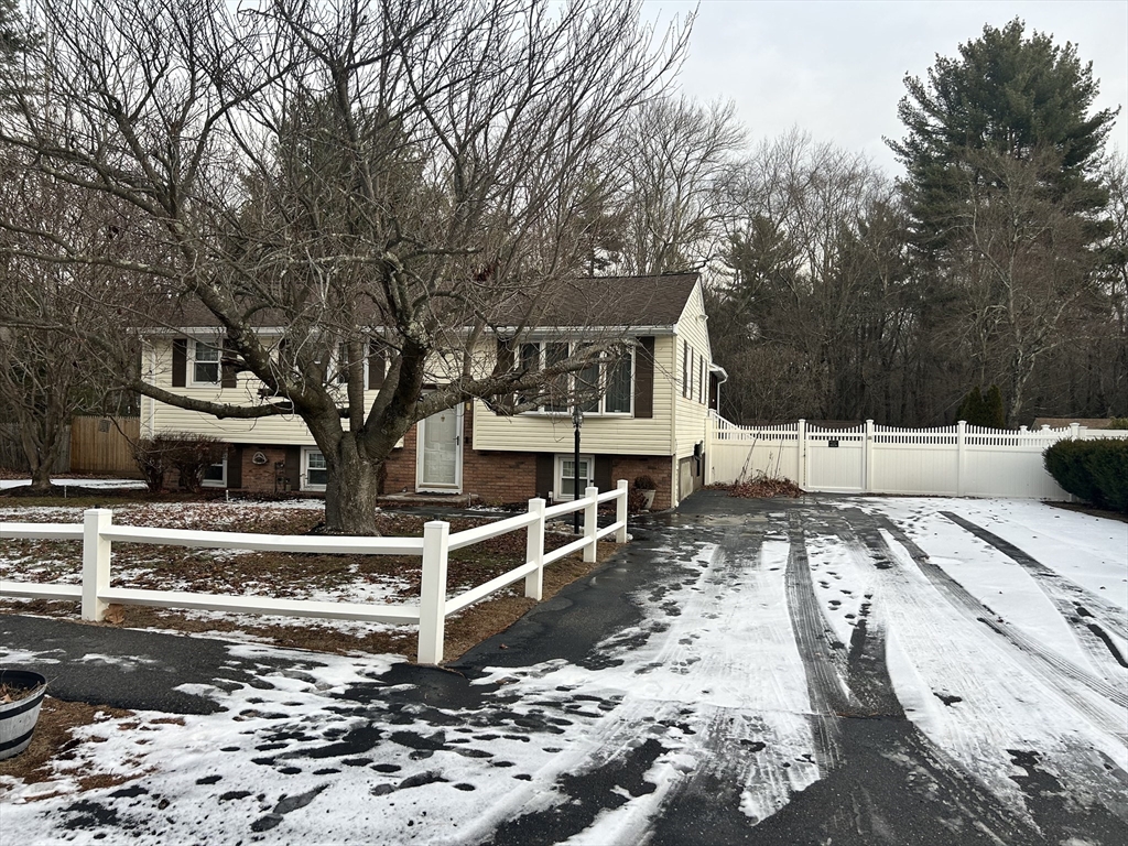 31 Harjean Road Billerica, MA 01821 - Photo 4 of 15 a view of a house with snow on the road