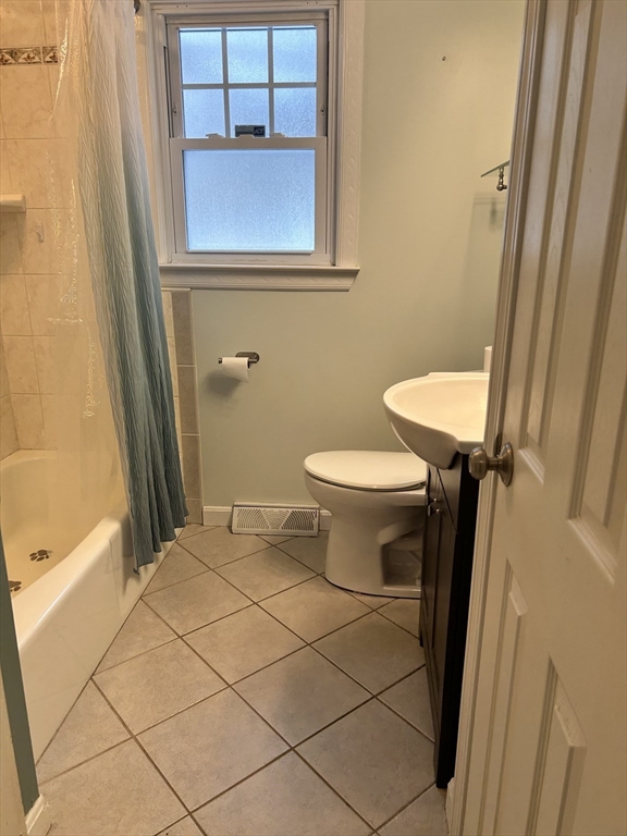 31 Harjean Road Billerica, MA 01821 - Photo 10 of 15 a bathroom with a granite countertop sink toilet and shower