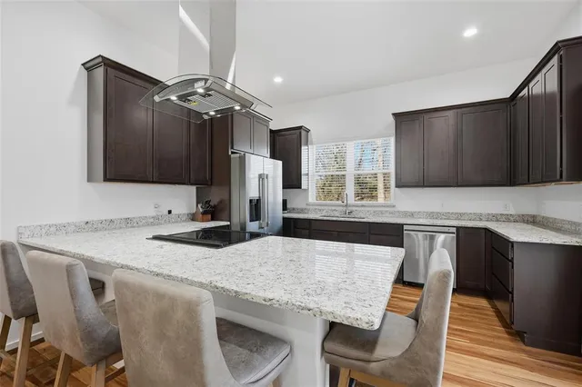 a living room with furniture and a rug