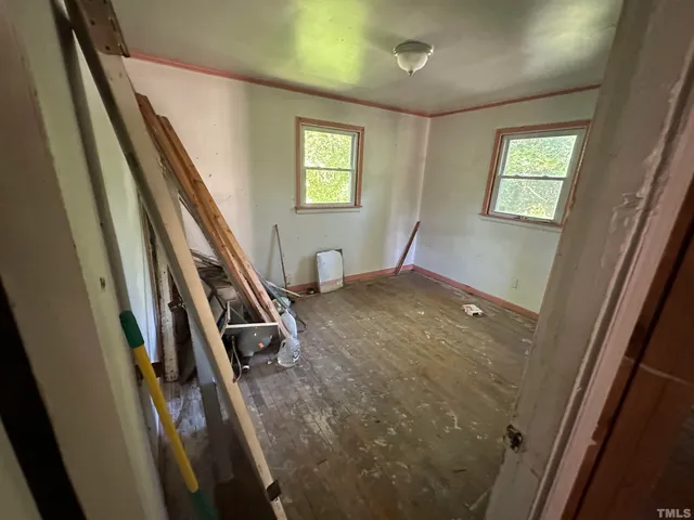 a view of a hallway with windows