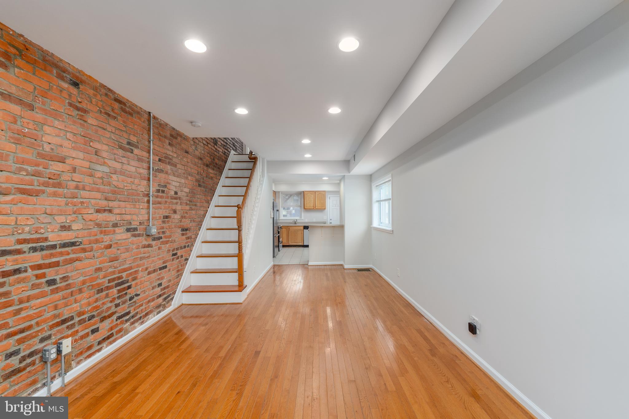 800 Grundy Street Baltimore, MD 21224 - Photo 4 of 41 Living & Dining Room leading to rear kitchen
