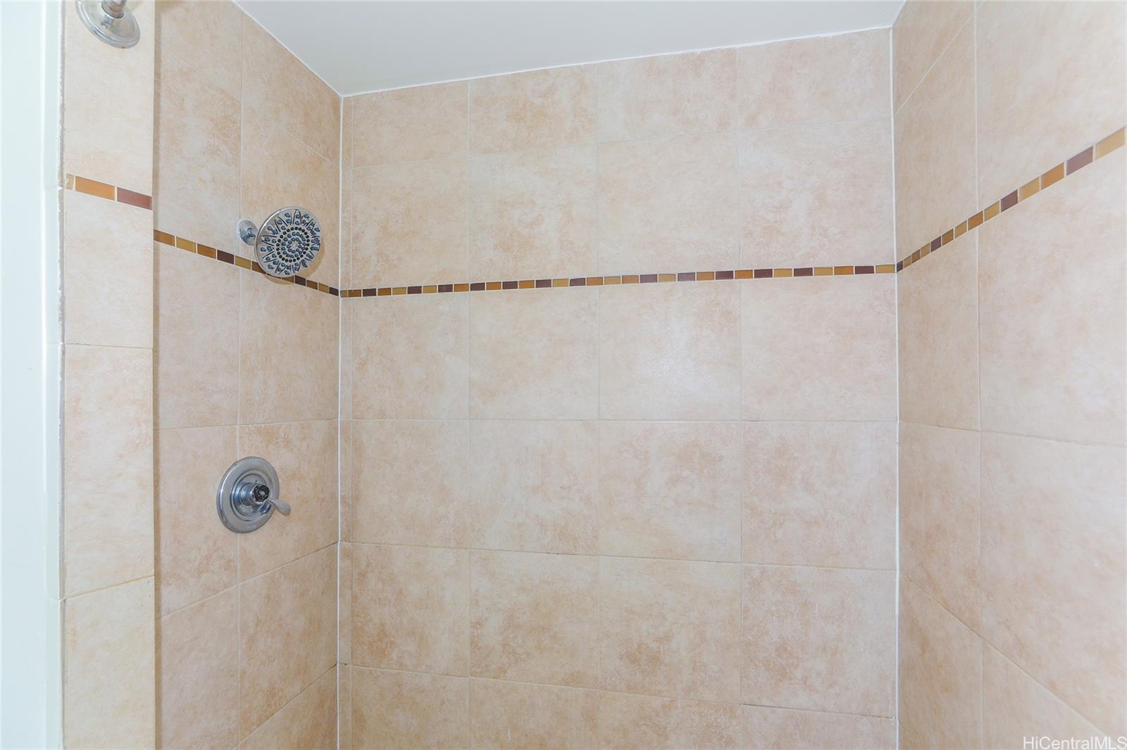1719 Nuuanu Avenue, Unit 5E Honolulu, HI 96817 - Photo 15 of 25 a bathroom with a shower