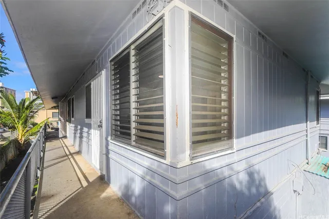 a view of balcony with furniture