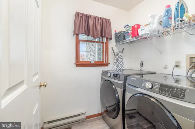 a utility room with dryer and washer