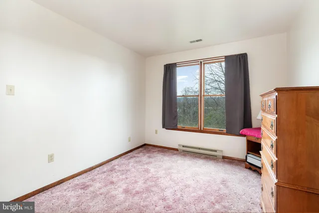 a room with toys and a large window