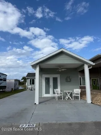 a view of a house with a patio