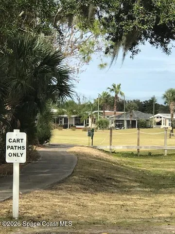 a view of a swimming pool with a lake view and mountain view