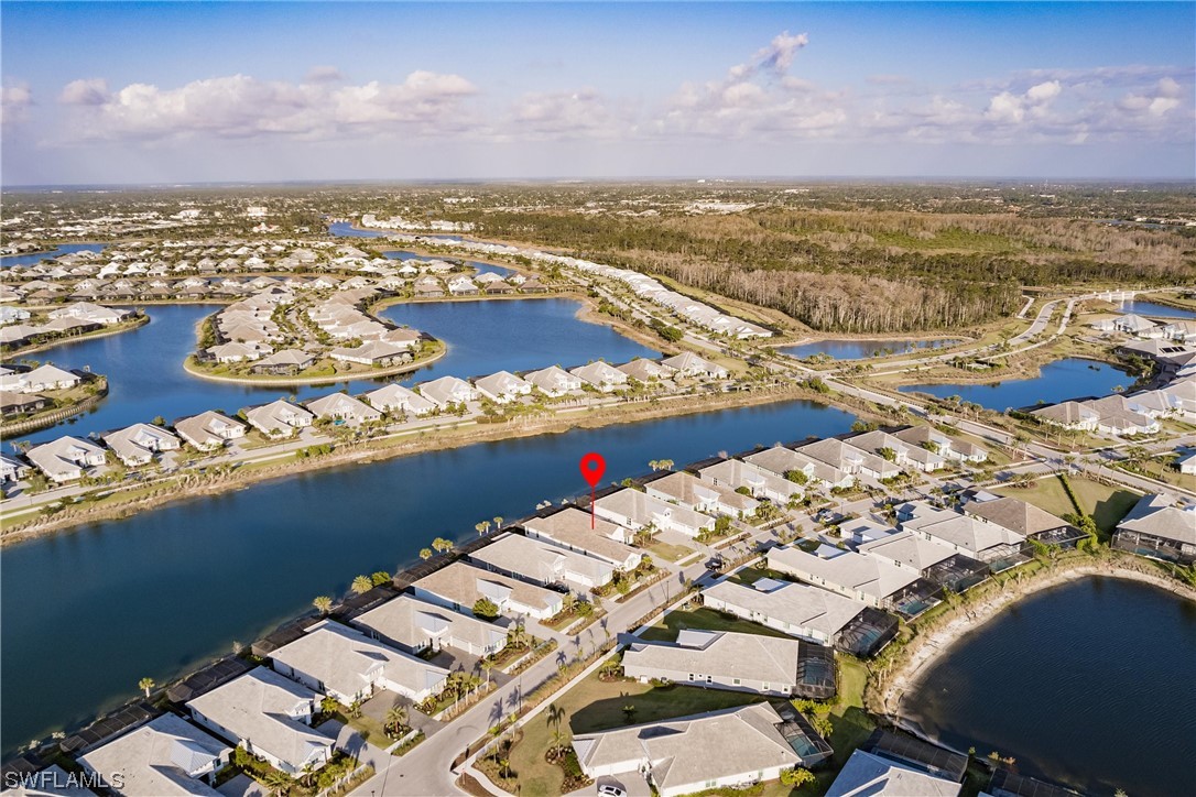 6181 Megans Bay Drive Naples, FL 34113 - Photo 24 of 32 a view of a city