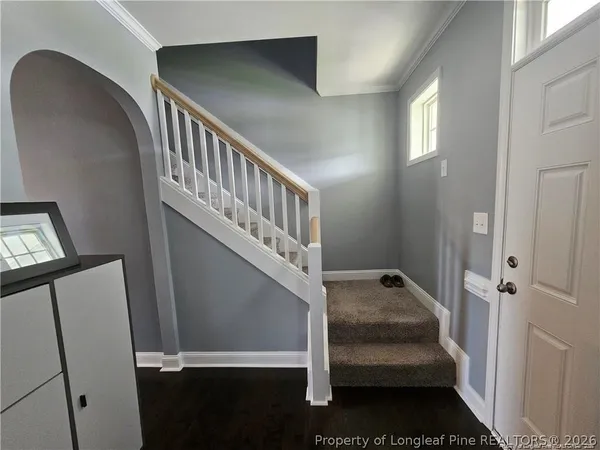a view of entryway with stairs