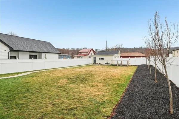 a bathroom with a tub and sink