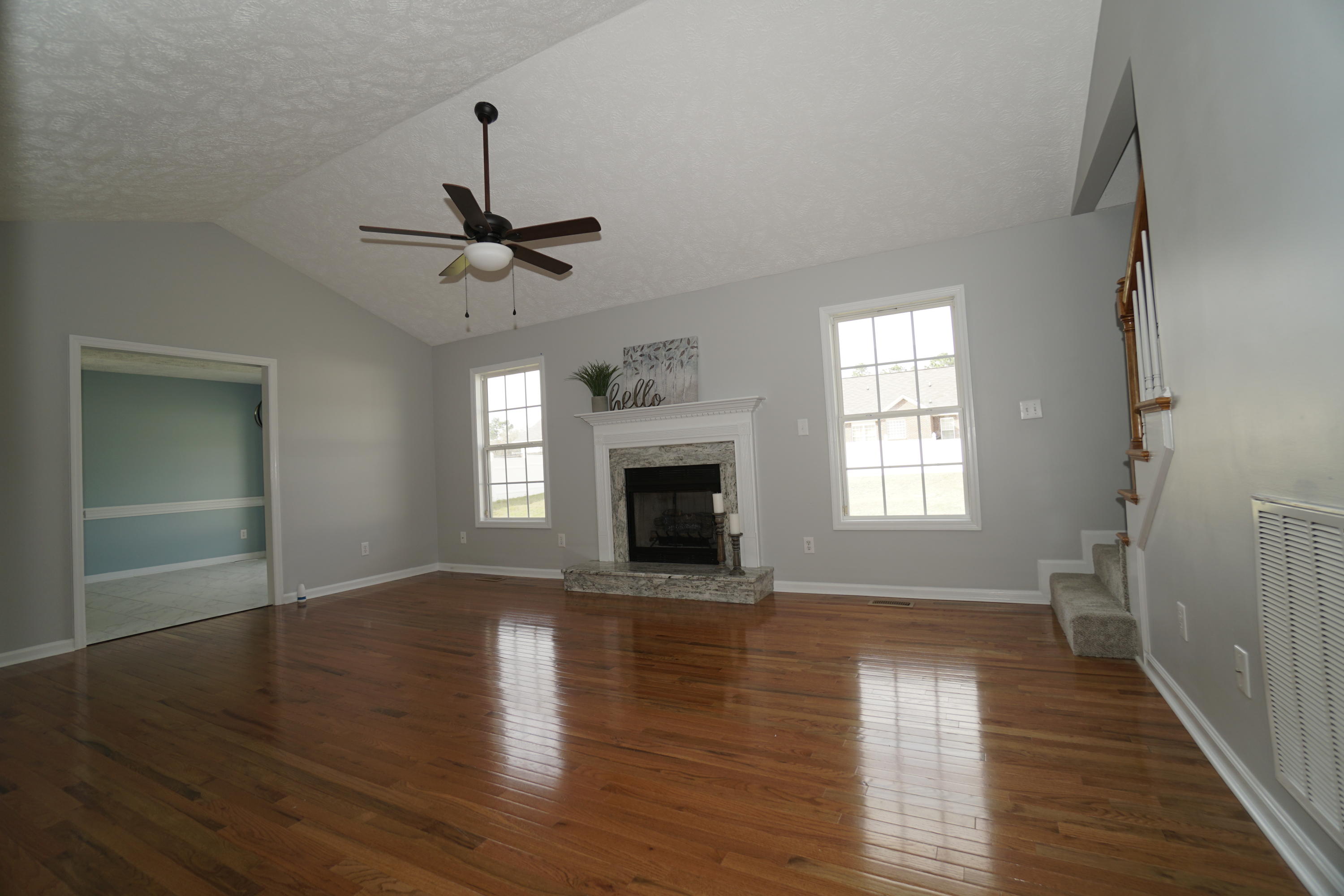 107 Cherian Court Pooler, GA 31322 - Photo 16 of 50 View of living room from walking straight in from the foyer. Living room has vaulted ceiling.