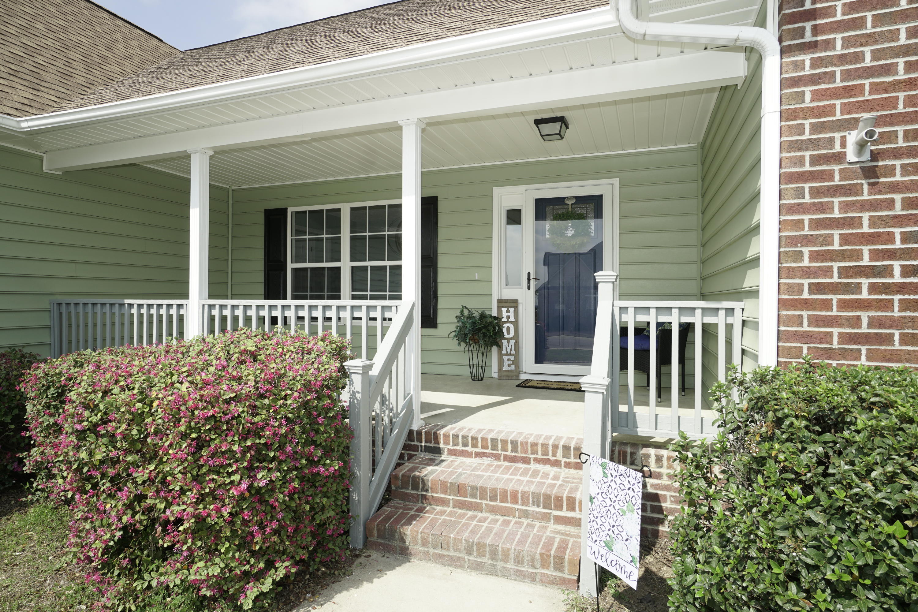 107 Cherian Court Pooler, GA 31322 - Photo 3 of 50 The inviting covered front porch - great place to relax and watch the neighbors!